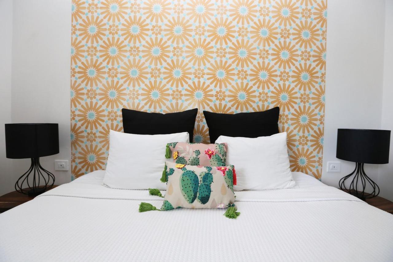 Casa Chukum Bacalar Exterior foto A bed with cushions