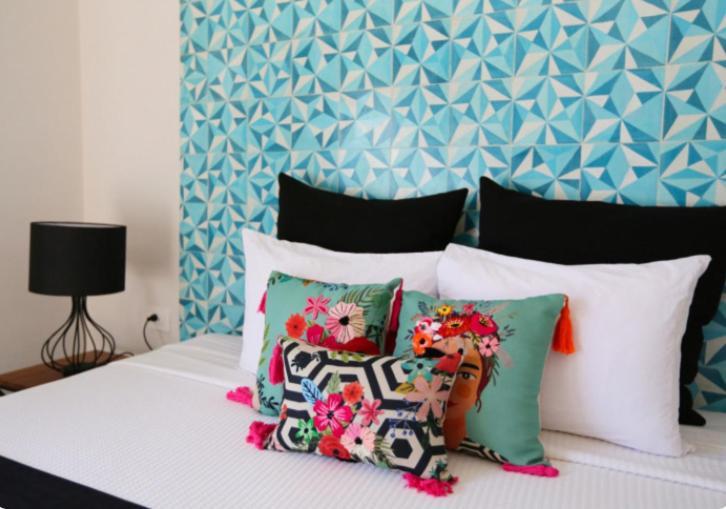 Casa Chukum Bacalar Exterior foto A bed with cushions